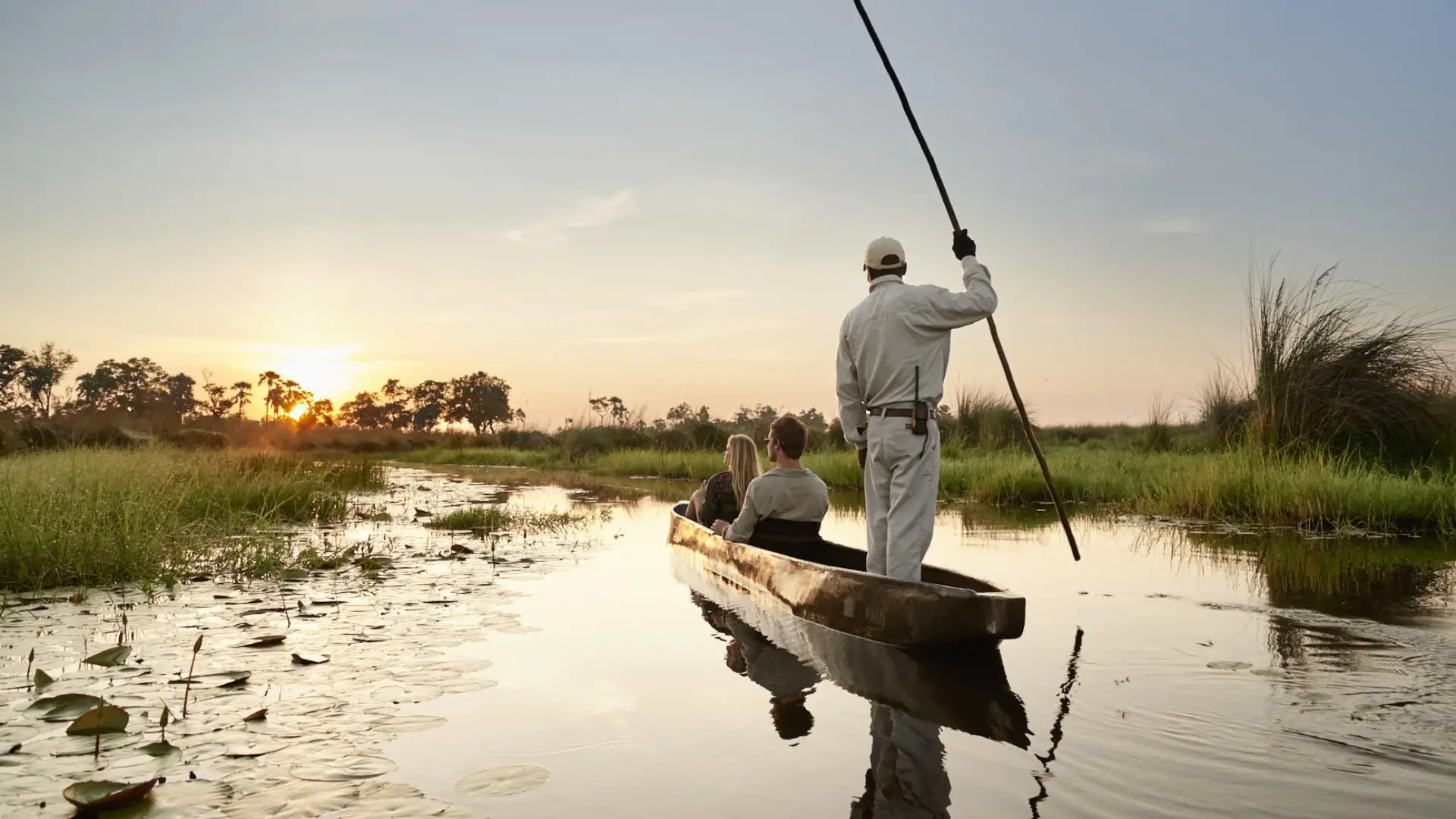 Sunset mokoro safari in the Okavango Delta